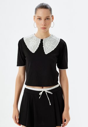 CROP - T-shirt con stampa - black