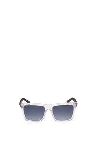Gafas de sol rectangulares claras con lentes oscuros degradados. Patillas suaves y mate en negro con un sutil detalle de marca. Montura ligera de acetato.