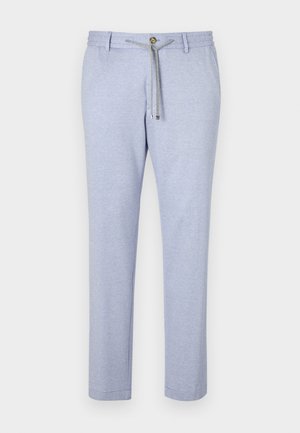 Svetlomodré voľné nohavice vyrobené z jemnej tkaniny, sťahovacie šnúrky, dekoratívny gombík a zoštíhlený strih s hladkou textúrou.