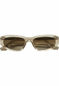 Ochelari de soare din plastic transparent, cu o formă elegantă de tip cat-eye, având lentile întunecate și o grosime subtilă a ramei pentru un aspect modern.