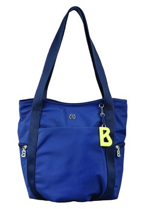 Sac cabas bleu marine avec larges bretelles, poche avant, fermetures éclair argentées, logo rond et porte-clés jaune en forme de lettre B suspendu à la sangle.