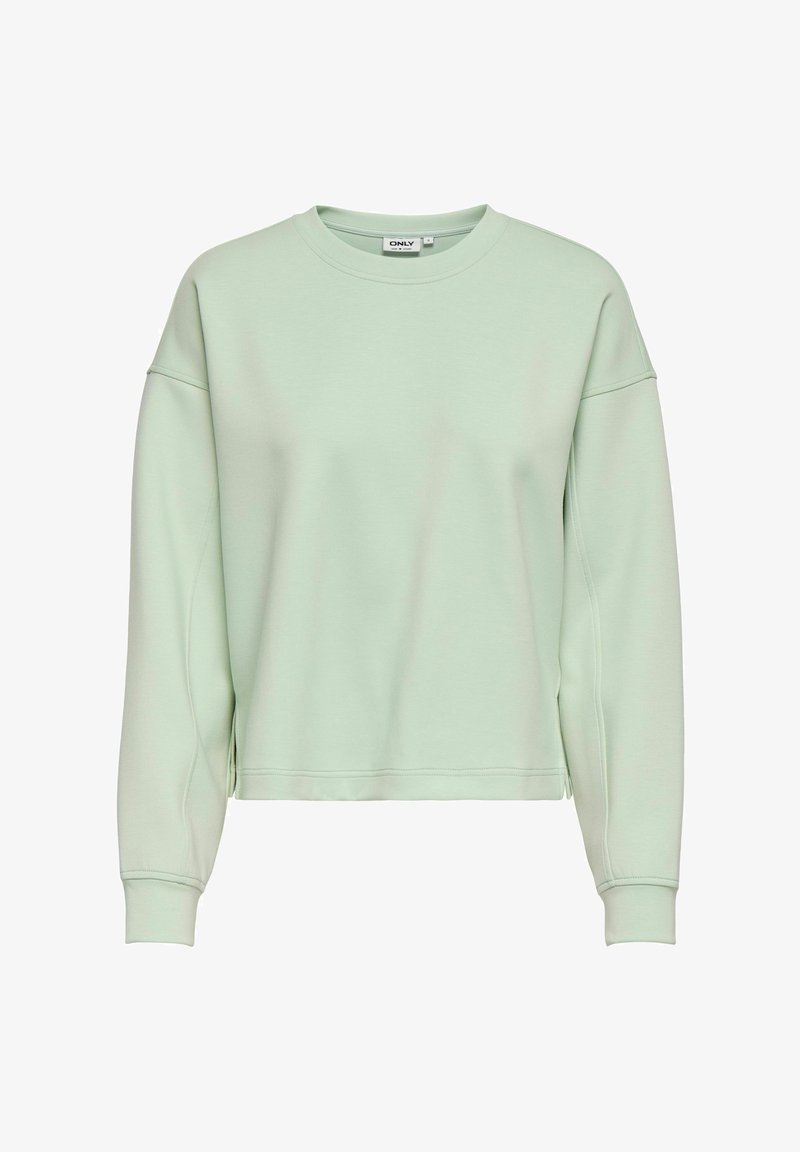 Sweat-shirt vert clair à col rond avec manches longues et poignets côtelés, présentant une coupe décontractée et une petite fente latérale à l'ourlet.