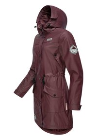 Waterproof maroon raincoat with a hood, drawstring waist, two front pockets, snap button closure, and an emblem on the sleeve.