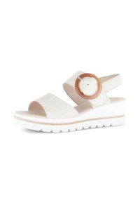 Witte wedge sandalen met een geweven textuurband, een ronde tan accent en een stevige witte rubberen zool voor extra grip.