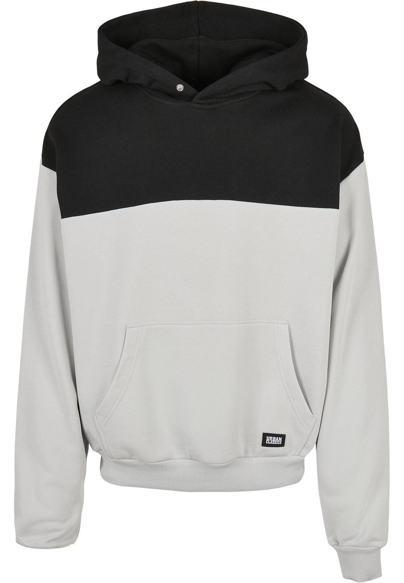 Hooded sweatshirt with a gray body and black top section, featuring a front pocket and ribbed cuffs. Made from soft textile material.