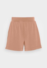 Shorts de couleur pêche en tissu doux, avec une taille élastique, des poches latérales et une coupe décontractée avec des ourlets cousus.