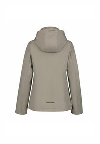 Beige waterdichte jas met een getailleerd ontwerp, verstelbare capuchon en lange mouwen. Kenmerkt zich door contrasterende stiksels en een reflecterende achterkant.