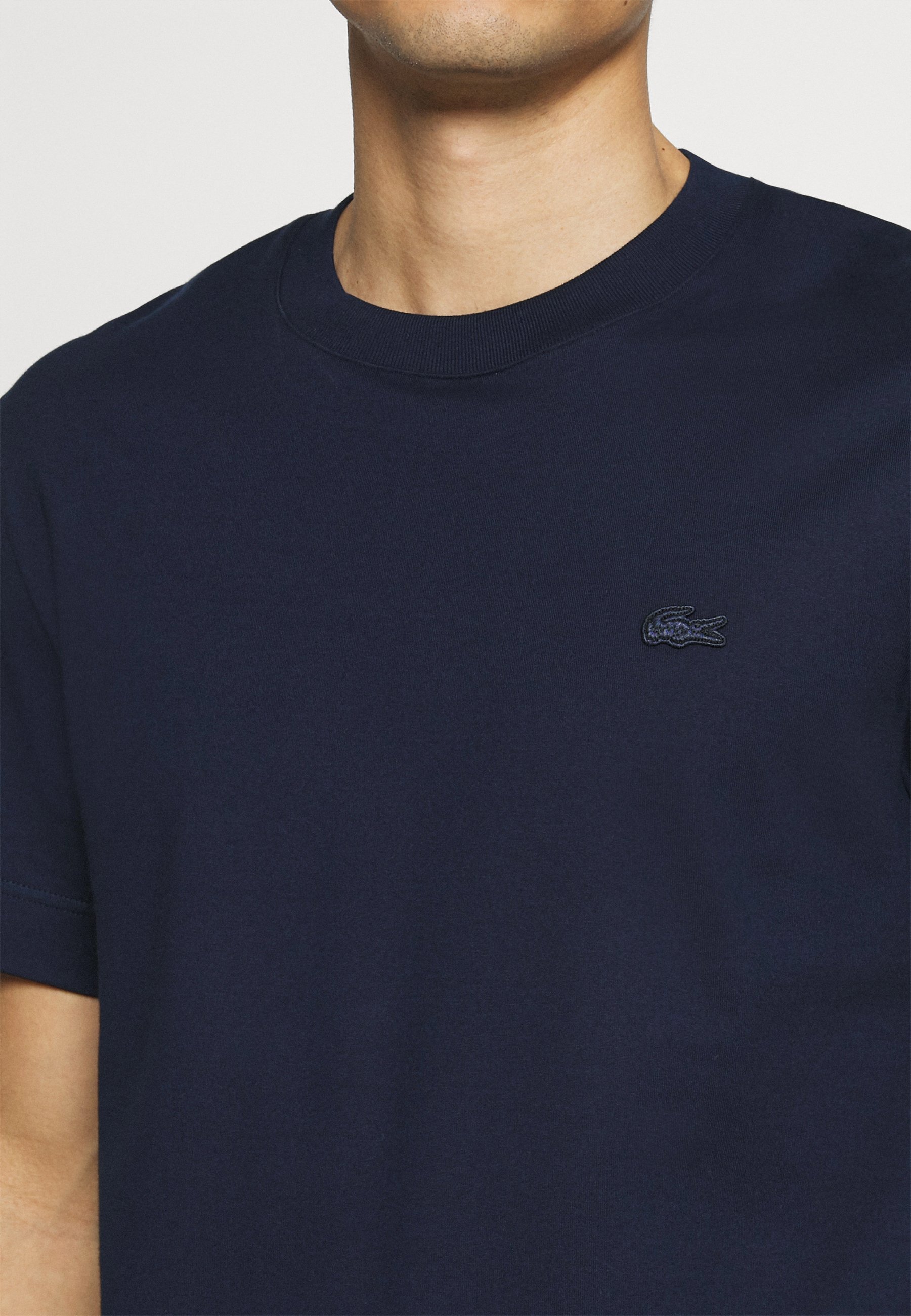 lacoste rubber logo