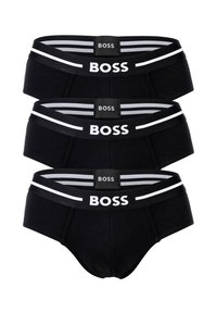 Schwarze Baumwollunterhosen im Dreierpack, ausgestattet mit einem breiten elastischen Bund mit "BOSS"-Logo und weißen Streifen. Glatte Textur, klassisches Brief-Design.