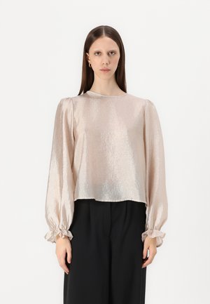 Light pink metallic blouse with long puffed sleeves and ruffled cuffs, featuring a round neckline and a cropped hemline.