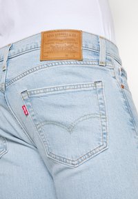 Levi's® 511 SLIM - Calças de ganga de perna direita - light indigo worn in
