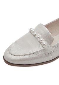 Metallic silver loafers with a smooth texture, featuring a decorative band of six round pearls across the instep and a slight heel.