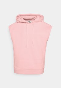 Sweat à capuche sans manches rose en tissu doux, avec une capuche à cordon de serrage et un design simple avec un ourlet droit.