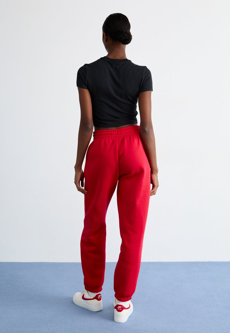 Nike Sportswear PANT Pantalon de survêtement university red