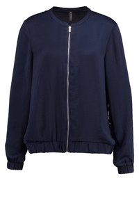 Marinblå zip-up jacka med rund halsringning, långa ärmar, elastisk midja och ett mjukt, lätt tyg.