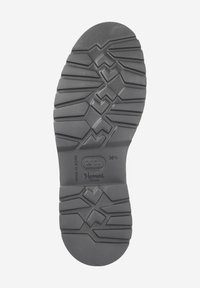 Black rubber shoe sole with textured zigzag grip pattern, embossed branding, and size marking. Flat profile suitable for various footwear styles.