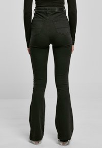 Urban Classics Bootcut-farkut - black