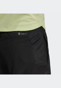 adidas Performance OWN THE RUN - Pantalón corto de deporte - black/silver