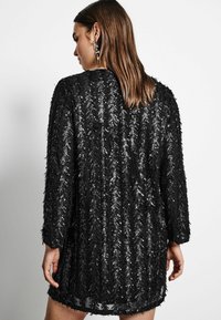 Next REGULAR FIT czarny