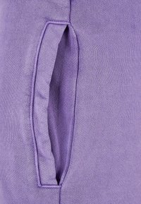 Karl Kani Jogginghose - lila