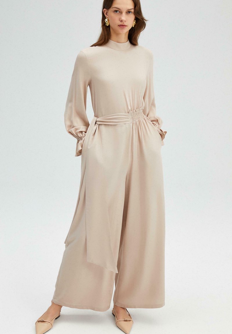 Touché Privé BELTED OVERALLS - Tuta jumpsuit - beige