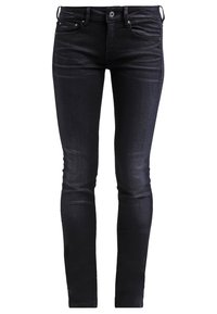 Tightsjeans i mörk indigo denim, med fem fickor, standard knappstängning och subtila slitage detaljer.