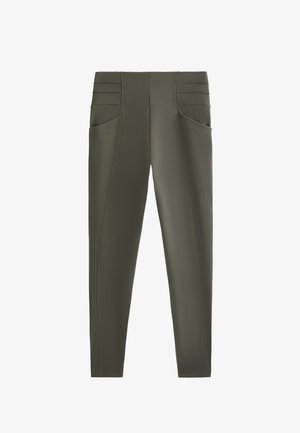 Olivově zelené přiléhavé kalhoty vyrobené z elastického materiálu, s dvěma bočními kapsami a texturovaným pasem s vodorovnými švy.