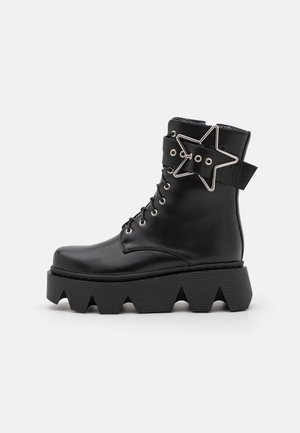 PLAYING GOD - Lace-up ankle boots - black