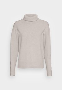 Ljusbeige polotröja i stickat tyg. Har ribbad krage, mudd och fåll. Enkel design med långa ärmar.