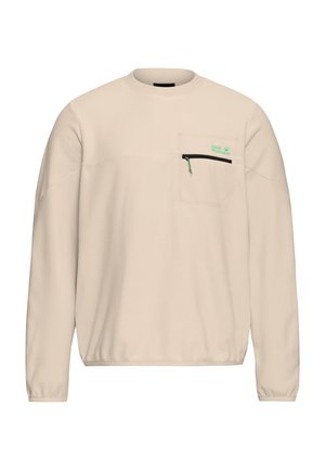 Beige Sweatshirt mit langen Ärmeln und Rundhalsausschnitt, mit einer Brusttasche mit schwarzem Reißverschluss und grünem "Jack Wolfskin"-Logo.