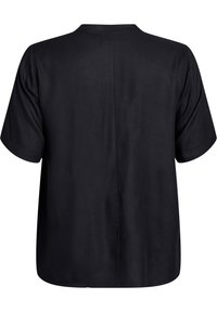 Black short-sleeve top with a relaxed shape, smooth fabric, round neckline, and a vertical seam down the center of the back.