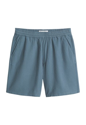 Blauwe shorts van gestructureerde stof met elastische tailleband en zijzakken, knielengte, zonder zichtbare sluitingen.