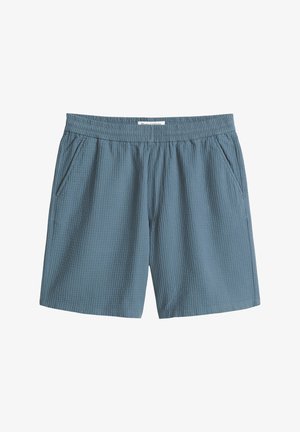 Blauwe shorts van gestructureerde stof met elastische tailleband en zijzakken, knielengte, zonder zichtbare sluitingen.