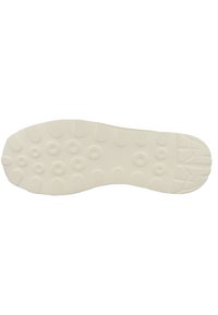 Suela de zapato blanca con hendiduras circulares, superficie texturada y una sección de tacón pronunciada. Diseño plano con características minimalistas.