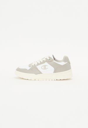 White and grey athletic sneaker with a textured upper, lace-up design, padded collar, and branded logo on the side. Simple, modern shape.