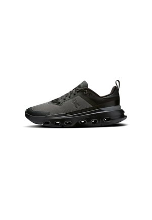 Men’s black athletic shoes with a textured mesh upper, padded collar, lace-up design, and a thick, cushioned sole featuring cut-outs.