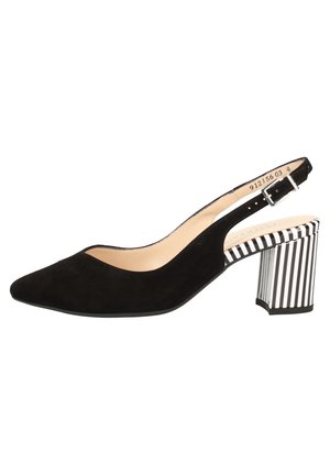Chaussure slingback en daim noir avec bout pointu et petit talon carré, ornée de rayures verticales noires et blanches.