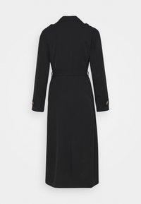 Black trench coat with long sleeves, side belt, and buttoned cuff straps; smooth fabric and knee-length design.