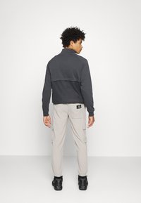 Redefined Rebel ARCHER PANTS UNISEX  - Calças de fato de treino - mourning dove