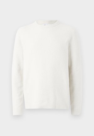 White textured sweater with a crew neck, long sleeves, and a slightly loose fit. The fabric appears soft and warm.