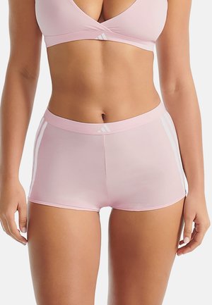 Pink athletic shorts with a smooth texture, elastic waistband, and contrasting white side stripes. Designed for comfort and mobility.