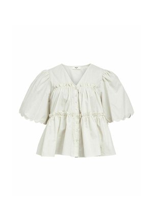 Lysfarvet bomuldsbluse med puffede ærmer, v-udskæring, frontknapper og en flæseaccent langs kroppen og ærmerne.