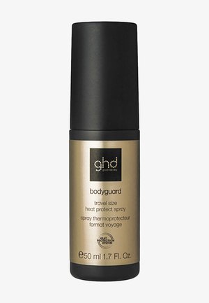 Petit flacon de spray protecteur thermique format voyage ghd Bodyguard avec bouchon noir et étiquette dorée, 50 ml 1,7 onces liquides.