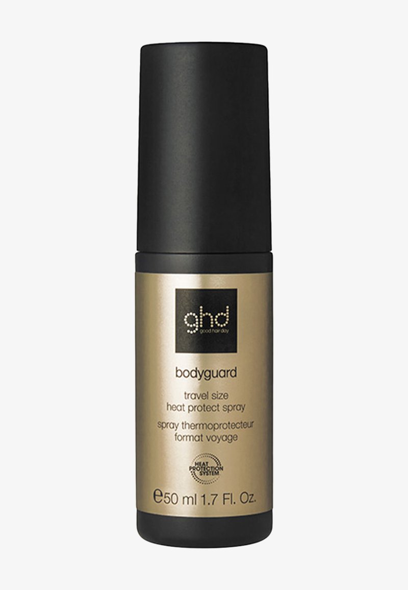 Petit flacon de spray protecteur thermique format voyage ghd Bodyguard avec bouchon noir et étiquette dorée, 50 ml 1,7 onces liquides.