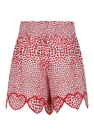 Pantaloni corti rossi e bianchi con motivo a cuori, elastico in vita e orlo a scallop con ritagli a forma di cuore. Tessuto leggero.