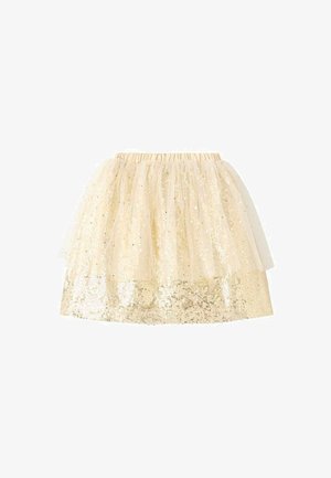 Jupe courte en tulle crème avec une partie inférieure ornée de sequins, présentant une taille élastique et un design superposé pour plus de texture.