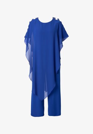 Tuta in chiffon blu con orlo asimmetrico, maniche ampie e dettagli sulle spalle. Tessuto leggero e fluido che garantisce una vestibilità morbida.