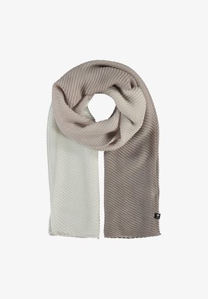 Écharpe côtelée douce pliée en boucle, avec un côté beige clair et l'autre écru, avec une petite étiquette noire sur le côté beige.