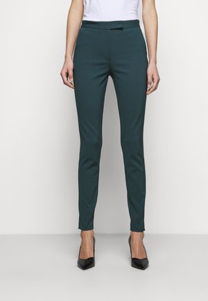 TAIKA - Pantalon classique - scarab green