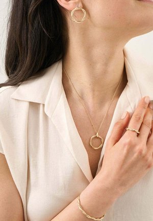 Saunier, Bague - gold-coloured